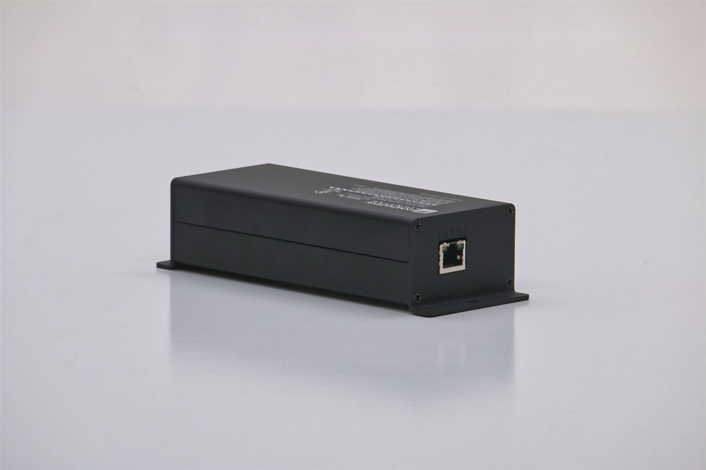 GENISYS PoE IntelliDrive input port side with labeled RJ45 INPUT