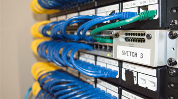 PoE network switch providing power and data for GENISYS lighting