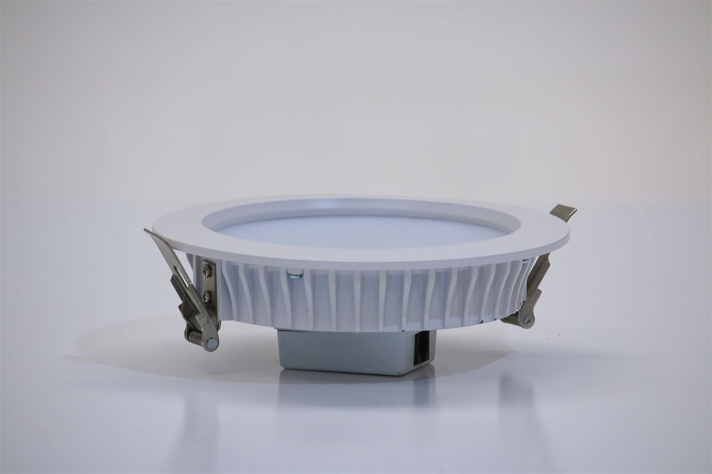 GENISYS PoE 6-inch downlight side view with RJ45 Ethernet port and mounting clips