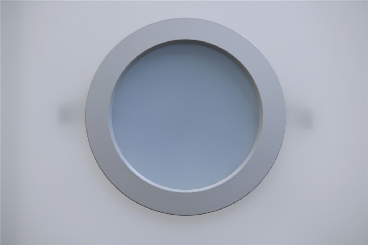 GENISYS PoE 6-inch LED downlight with white trim and frosted diffuser