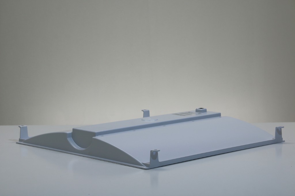 Rear view of GENISYS Leaf Troffer showing lightweight composite housing and grid mounting tabs