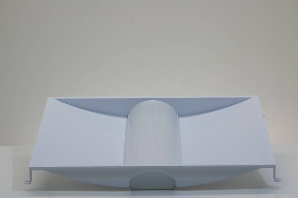Side profile of GENISYS Leaf Troffer PoE lighting fixture showing curved leaf reflectors