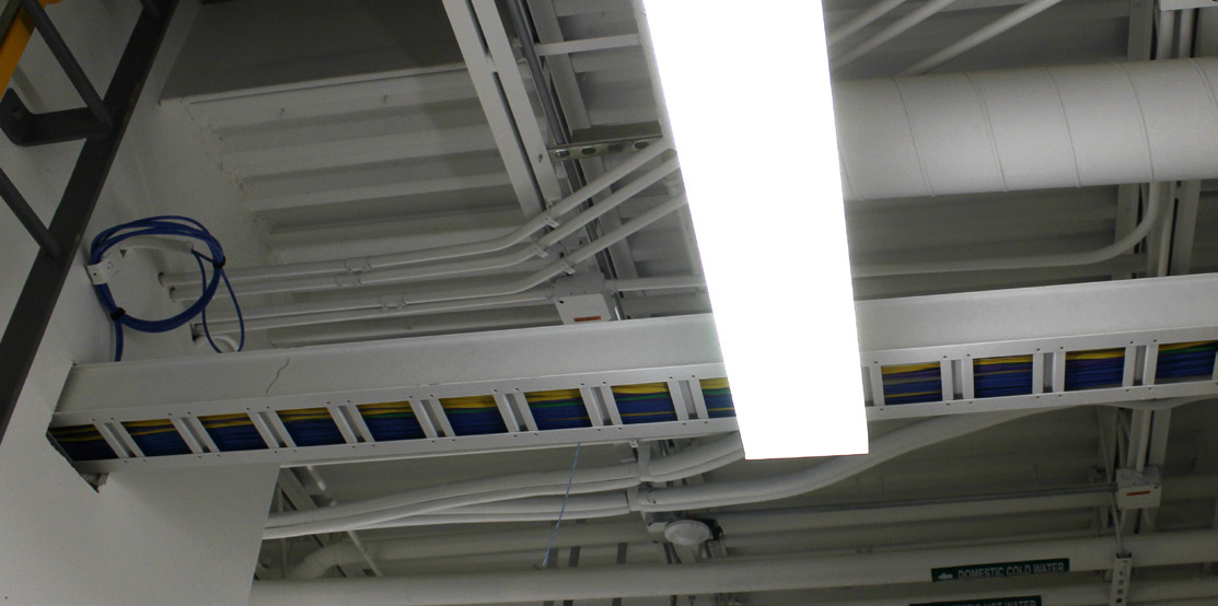 Open office workspace at Dubuque West Campus with GENISYS PoE lighting