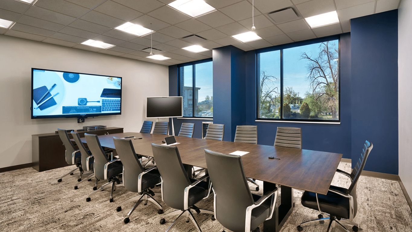 Groove conference room with GENISYS PoE troffer lighting and collaborative AV setup