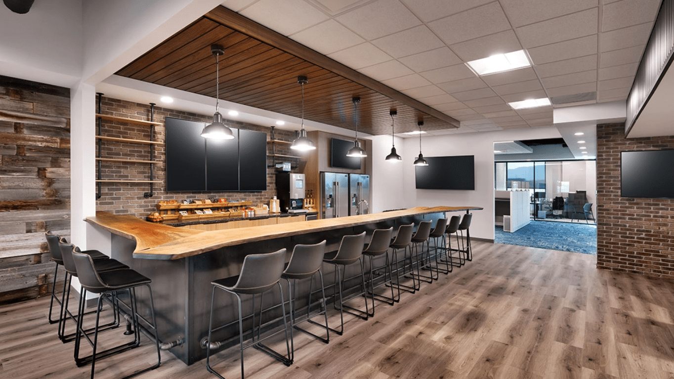 Groove headquarters social hub and bar with GENISYS PoE pendant and panel lighting