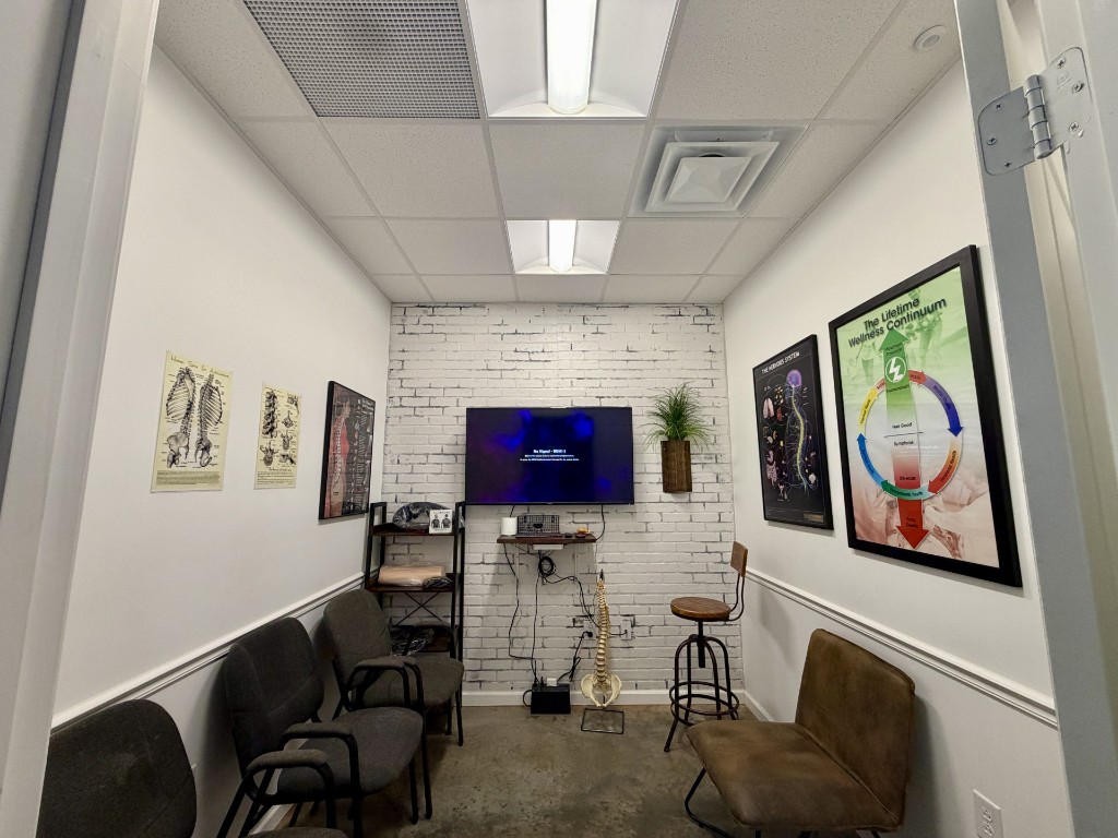 Consultation room with GENISYS PoE troffer lighting at Liberation Chiropractic
