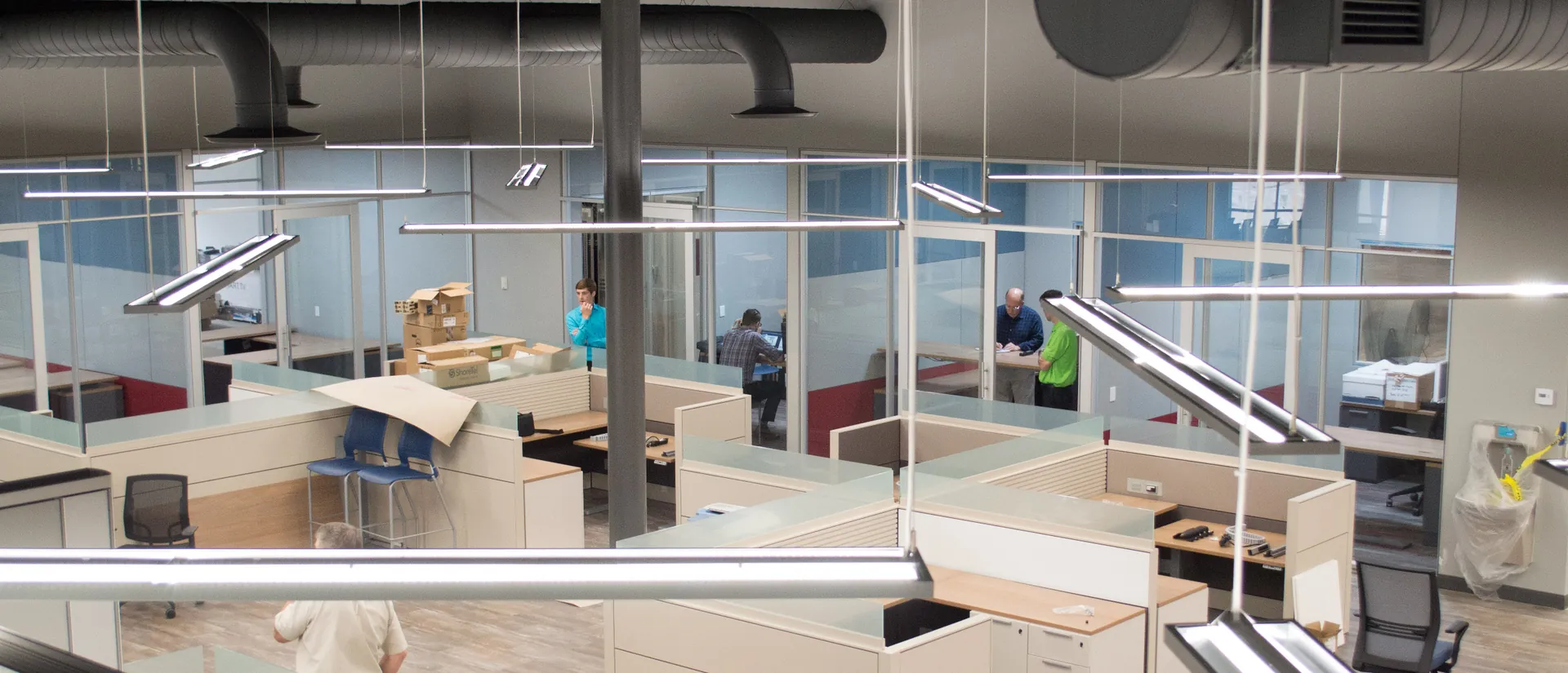 MidAmerican Aerospace open work area with GENISYS PoE fixtures
