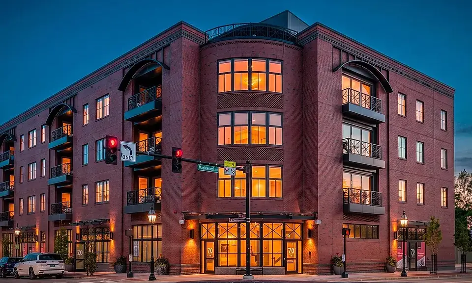 Portsmouth mixed-use condos at dusk with GENISYS PoE lighting in every residence