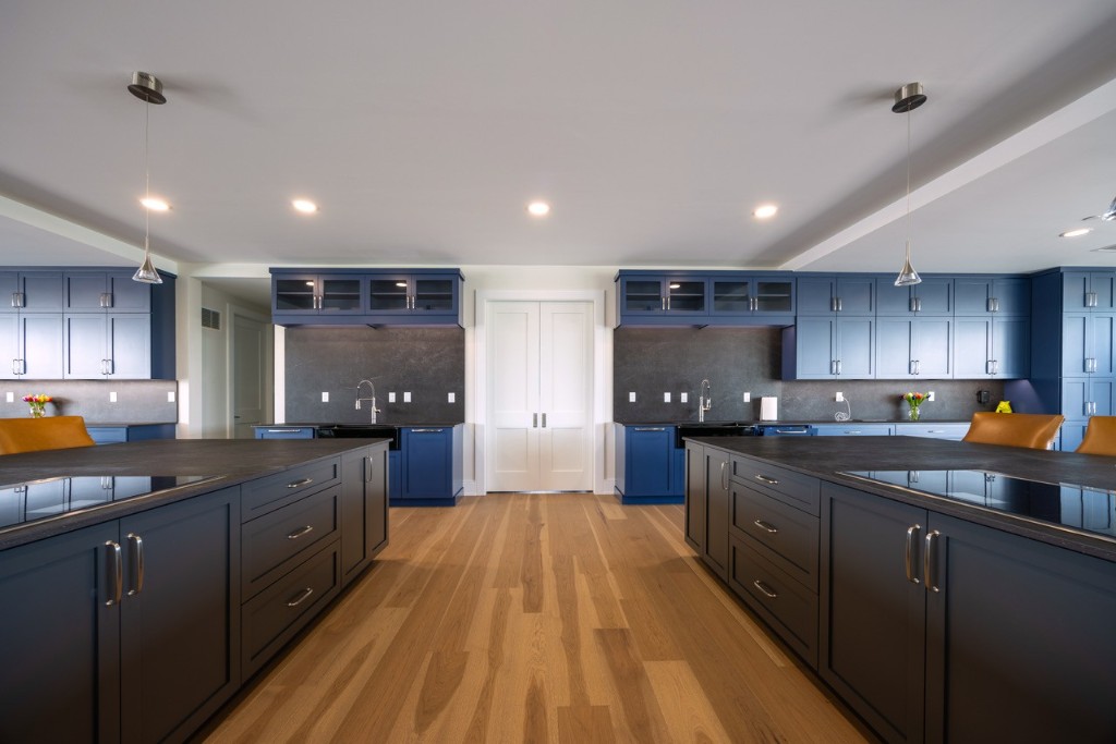 Portsmouth penthouse kitchen with GENISYS PoE downlights over dual islands