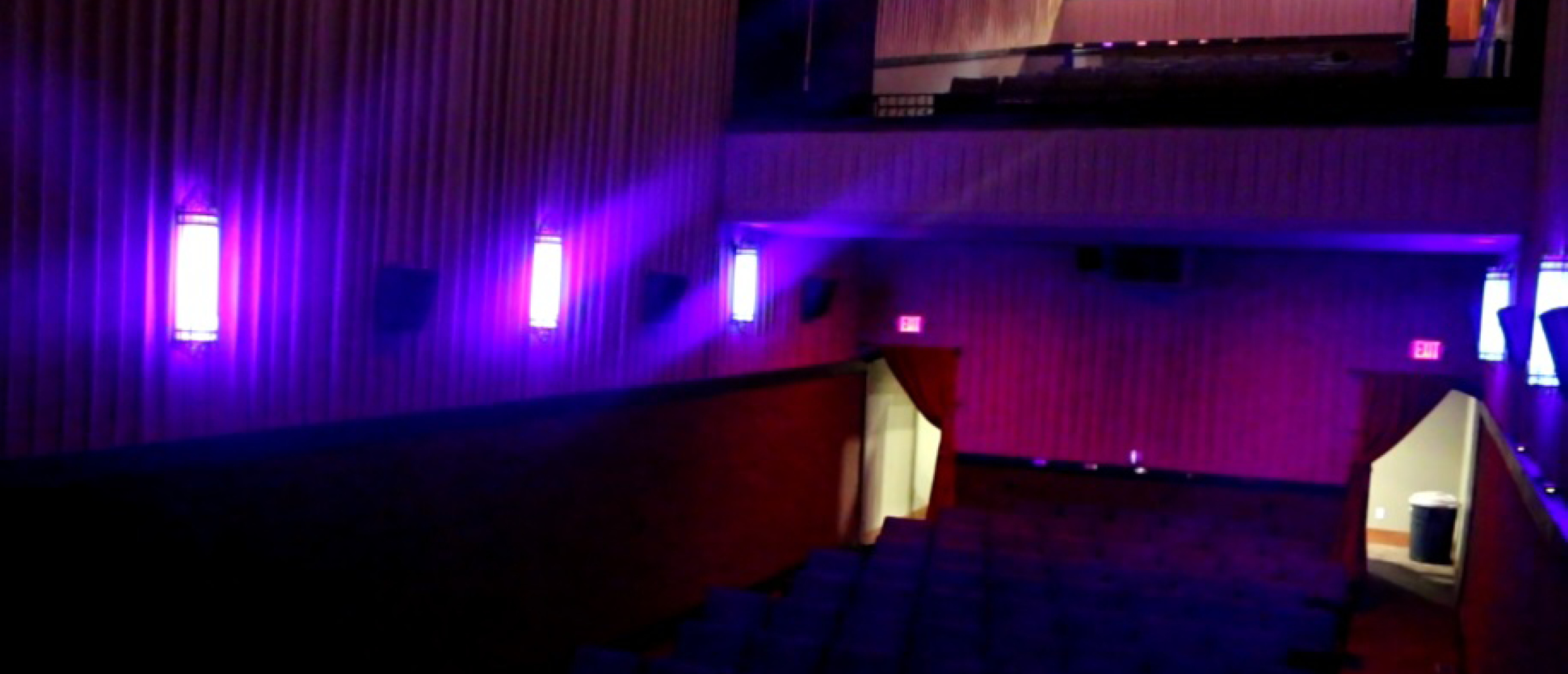 Iowa Theater auditorium with purple GENISYS PoE house lighting scene